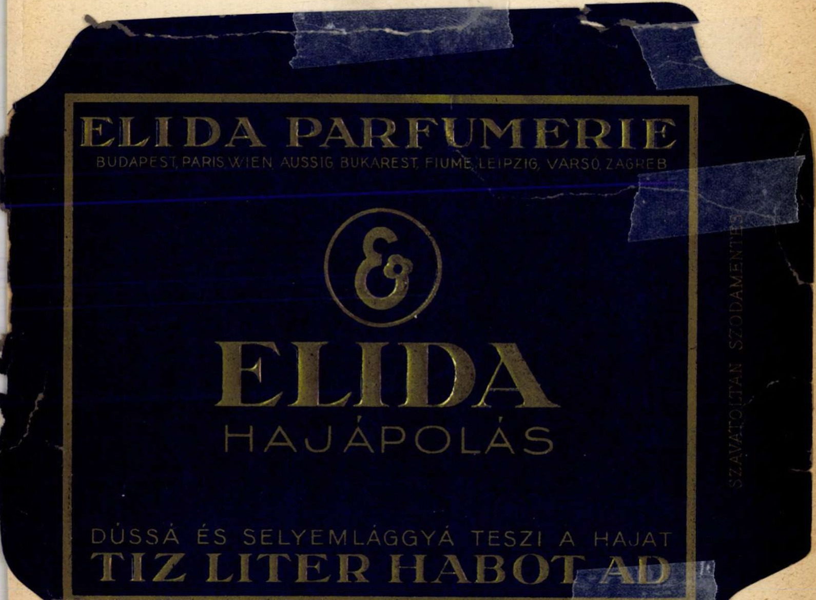 Az Elida Parfümerie sötétkék és arany hajápolási termékcsomagolása.